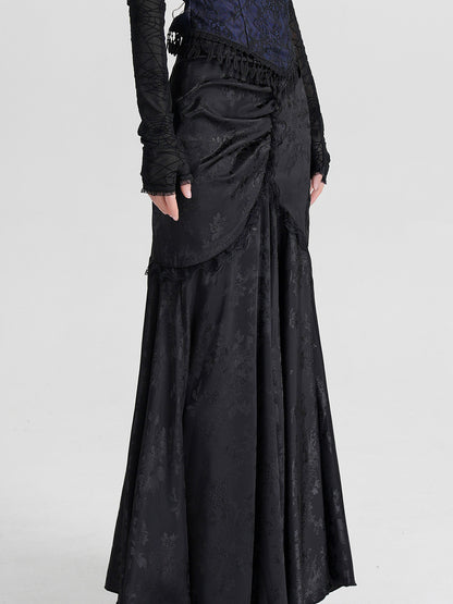 Black jacquard midi skirt with asymmetrical draped front and pleated panels
