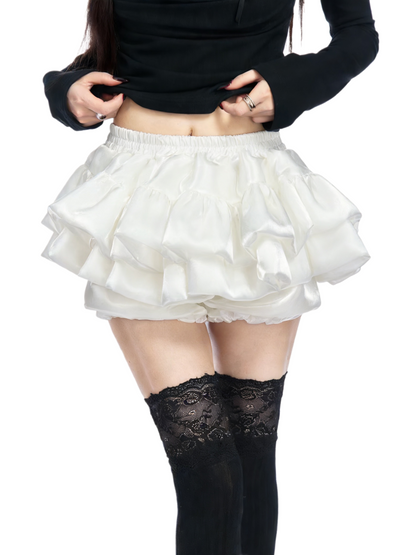 White tiered ruffle skirt with gathered elastic waistband and layered fabric