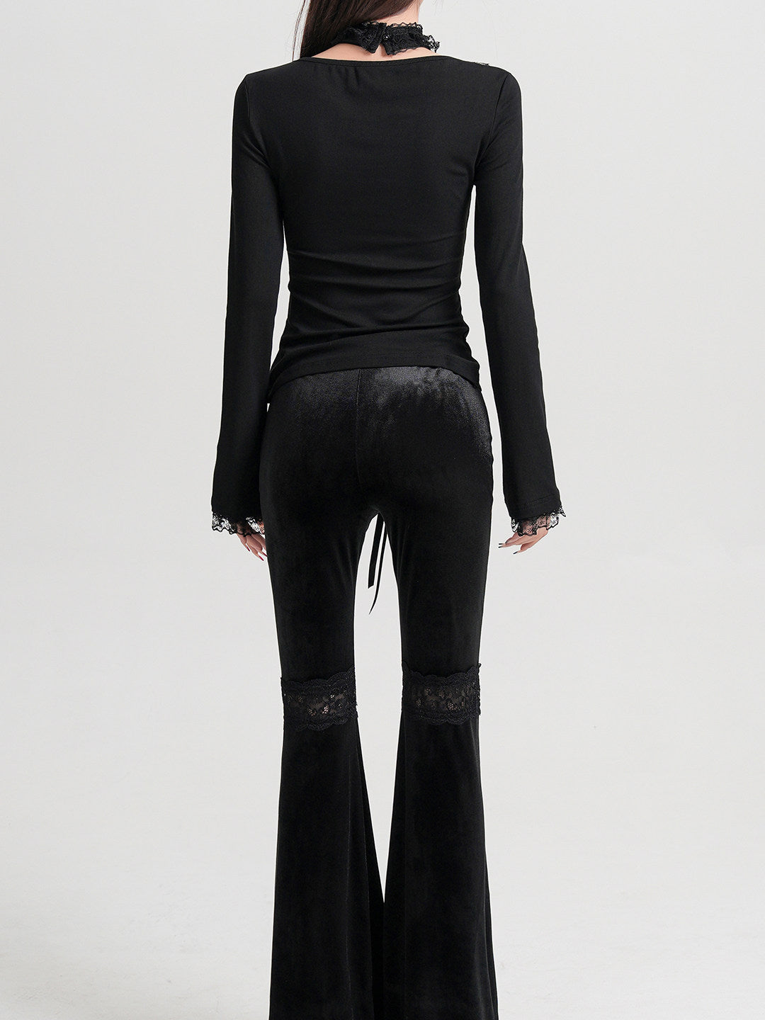 Black long-sleeve top back view with lace choker and scalloped lace cuffs