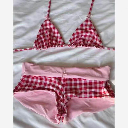 Red-and-white gingham bikini set with triangle bra top and matching shorts