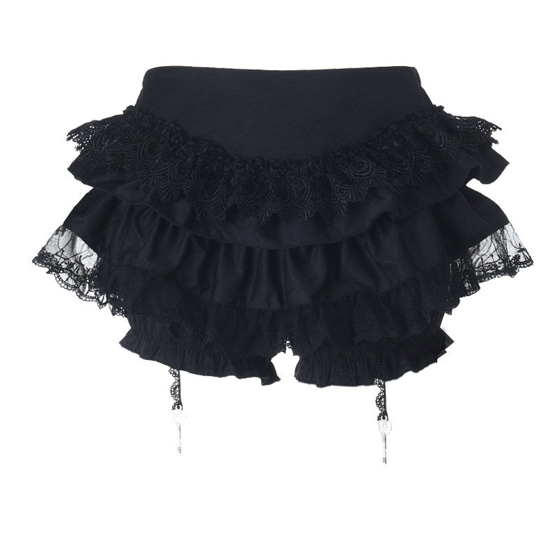 Black ruffled doll skirt with scalloped lace hem and hanging strings