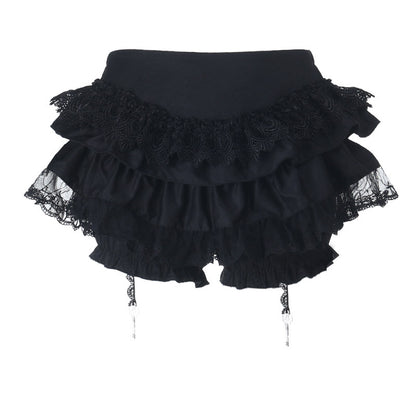 Black ruffled doll skirt with scalloped lace hem and hanging strings