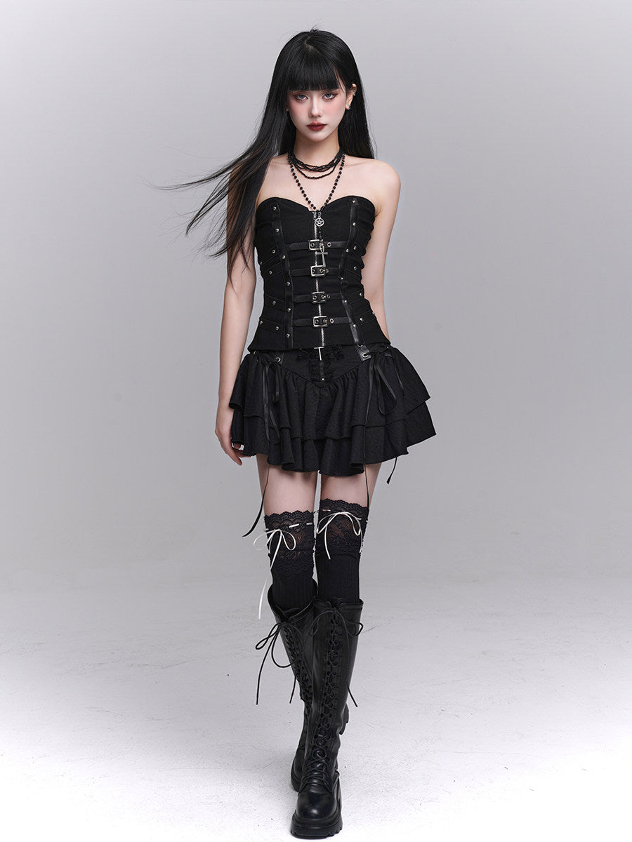Black strapless bandeau corset top with layered buckle straps and ruffled panel