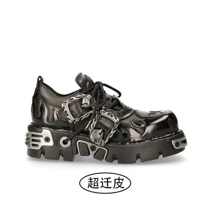Black lace-up platform shoes with silver hardware and chunky treaded sole