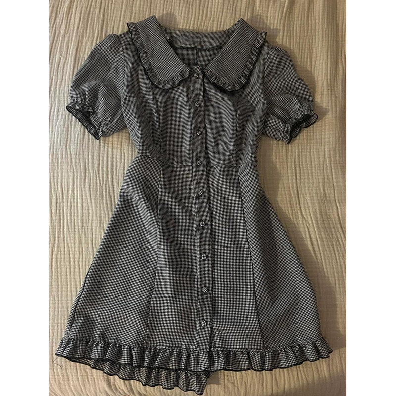 Plaid midi dress with doll collar, button front, puff sleeves, fitted waist seam, ruffle hem