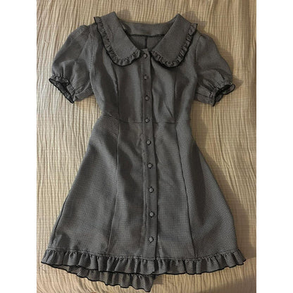 Plaid midi dress with doll collar, button front, puff sleeves, fitted waist seam, ruffle hem