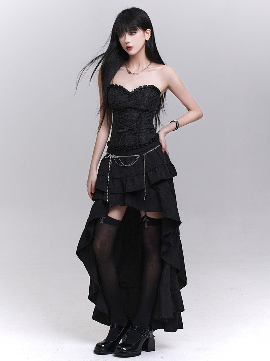 Black layered mini skirt with asym ruffle tiers and dangling silver waist chains