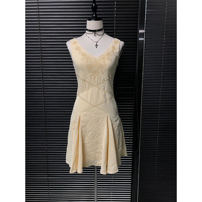 Embroidered chiffon fairy dress in light yellow with gold embroidered yoke and hem