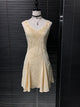 Embroidered chiffon fairy dress in light yellow with V-neck and flared skirt