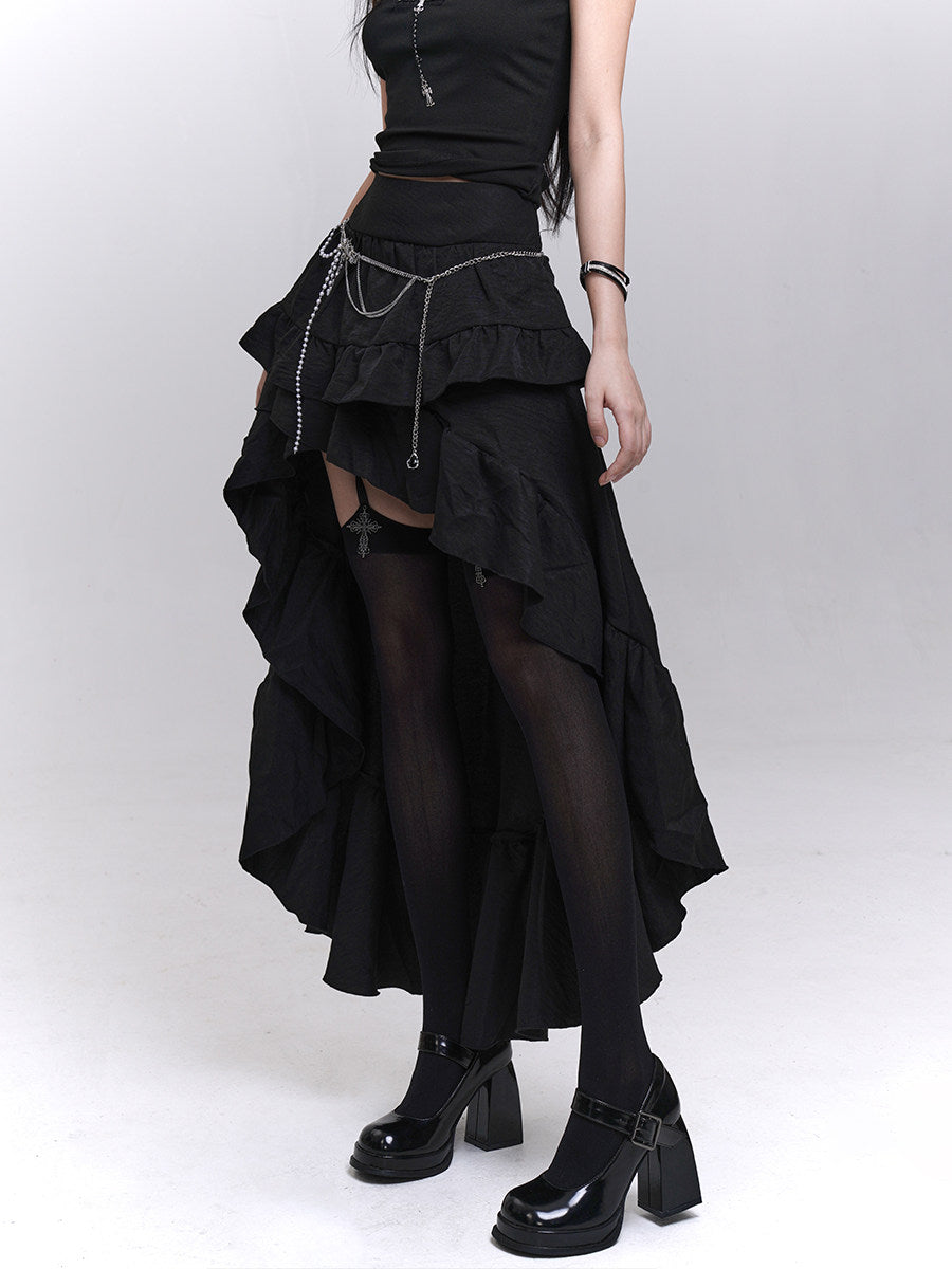 Black layered mini skirt with asymmetric ruffle tiers and draped mesh underlayer