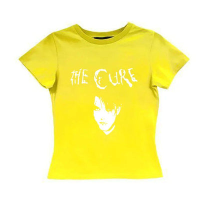 Yellow graphic tee with white The Cure logo and portrait print
