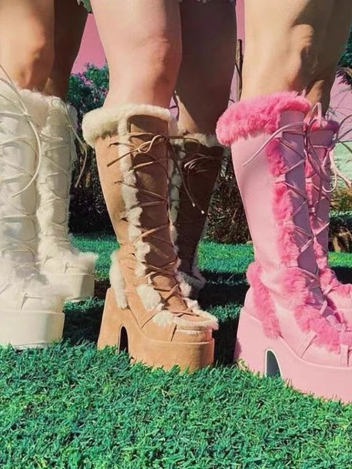 Brown and pink platform ankle boots, lace-up style with faux-fur trim and chunky heel