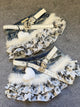 Ruffled denim skirt with butterfly print, white faux-fur trim, studded belt straps