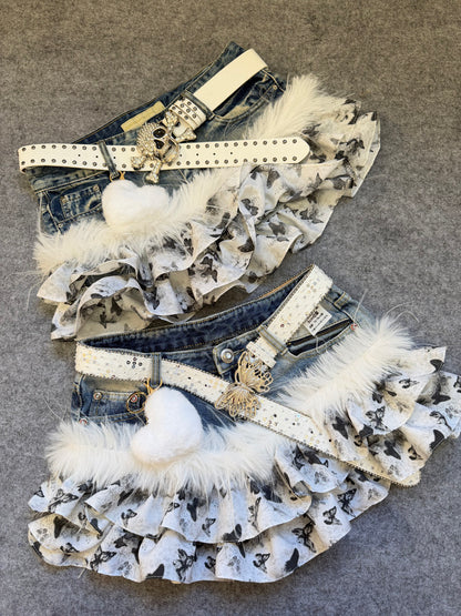 Denim butterfly ruffle skirt with white faux-fur trim and studded belt straps