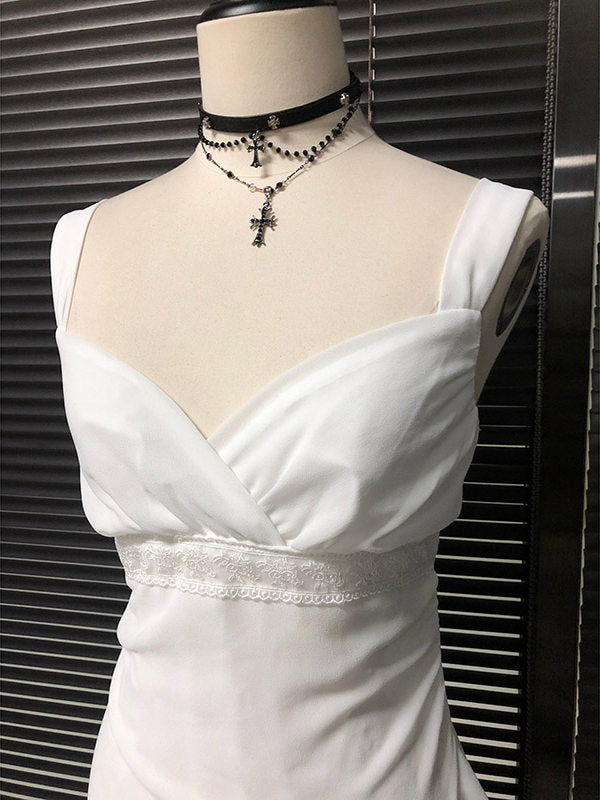White chiffon camisole dress with scalloped lace trim at waist and draped V bodice