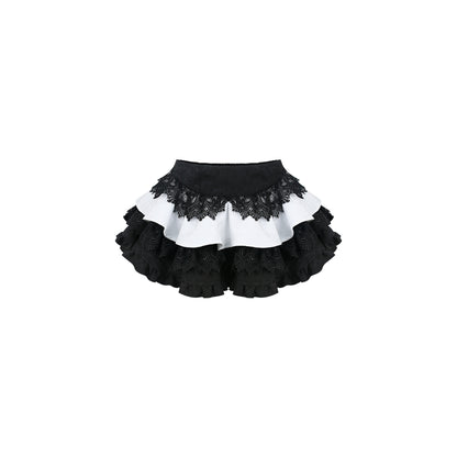 Black-and-white layered cake skirt with black lace ruffle hem and white underlayer