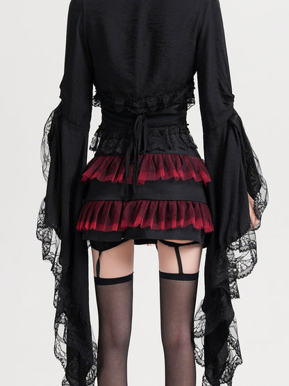 Black cropped lace coat with flared sleeves, lace cuffs, and waist tie detail.