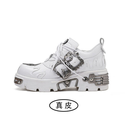 White lace-up platform shoes with metal ornament strap across the vamp
