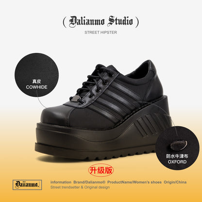 Black leather platform lace-up sneaker with striped panels and thick ridged sole