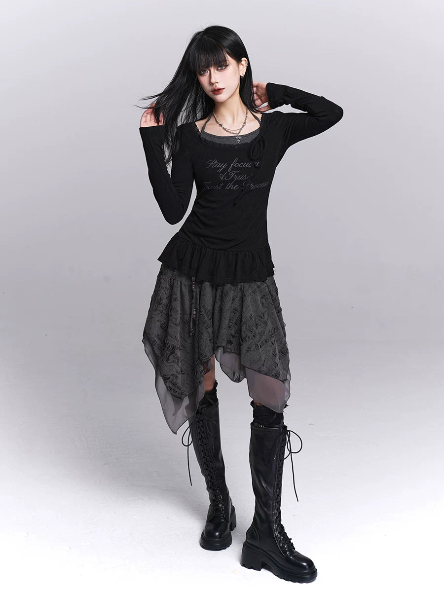 Black long-sleeve dress with off-shoulder neckline, layered ruffle hem, sheer skirt