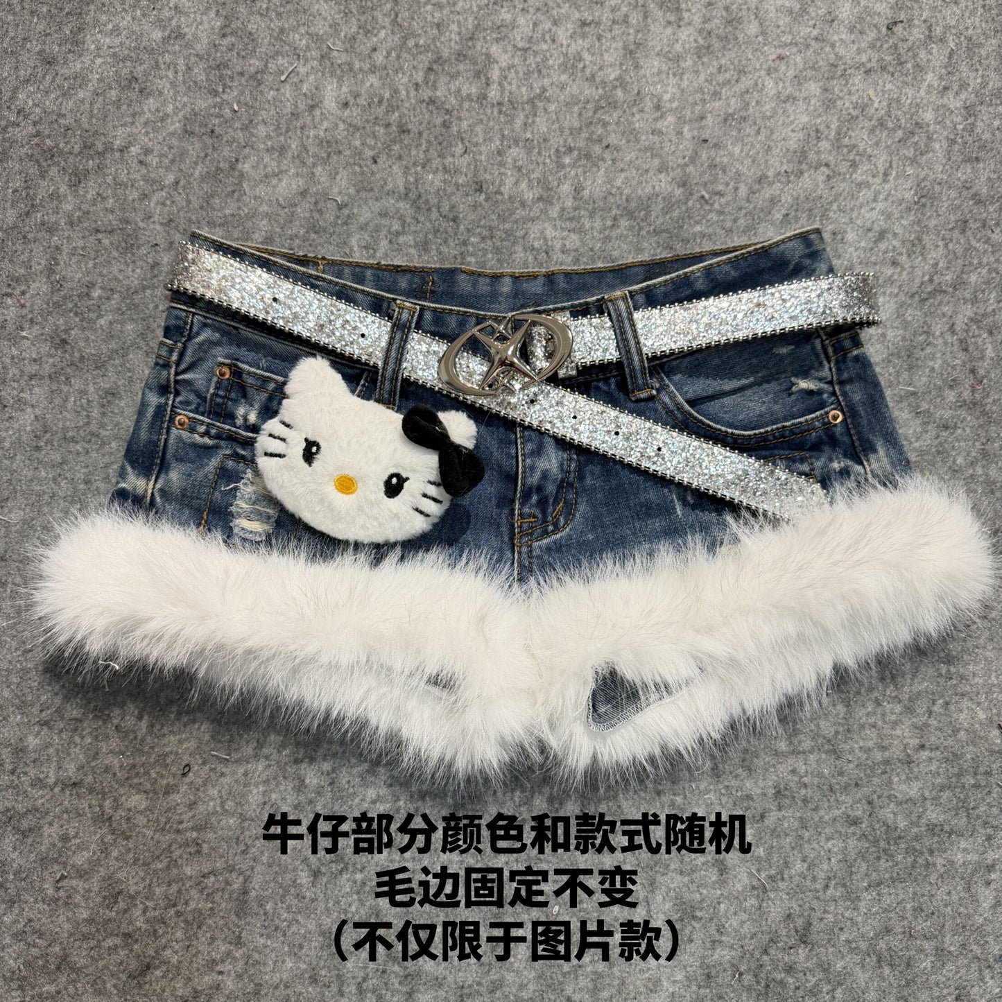 Dark blue denim shorts with white faux-fur trim and glitter belt with cat face charm