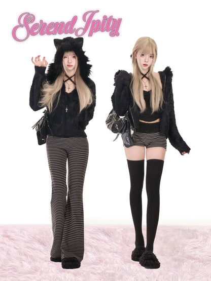 Black faux fur hooded jacket with striped flared pants and thigh-highs
