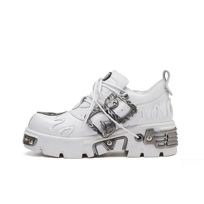 White lace-up platform shoes with metal side buckles and raised tread sole