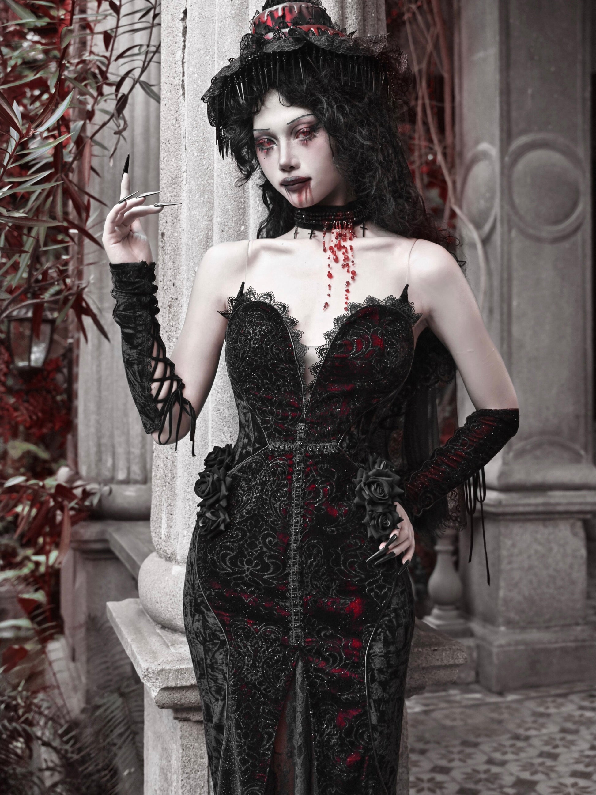 Black gothic corset maxi dress with red embroidery, sweetheart neckline, lace rosette details.