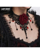 Black lace choker necklace with red rose centerpiece and dangling bead accents