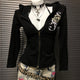 Black zip-up hooded sweatshirt jacket with chest graphic and front pockets