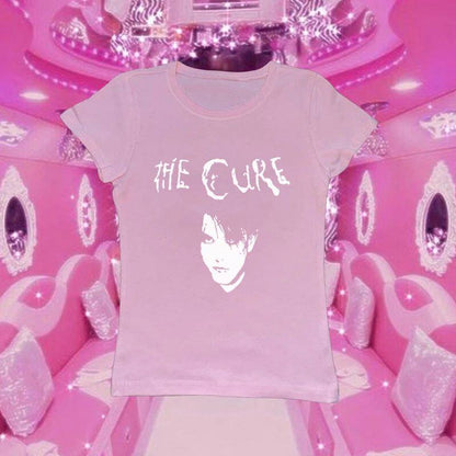 Light pink crewneck graphic T-shirt with band text and face portrait print