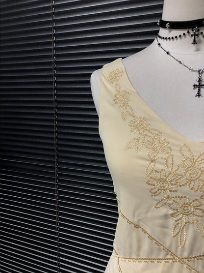 Embroidered chiffon fairy dress bodice with gold floral appliqué and V neckline