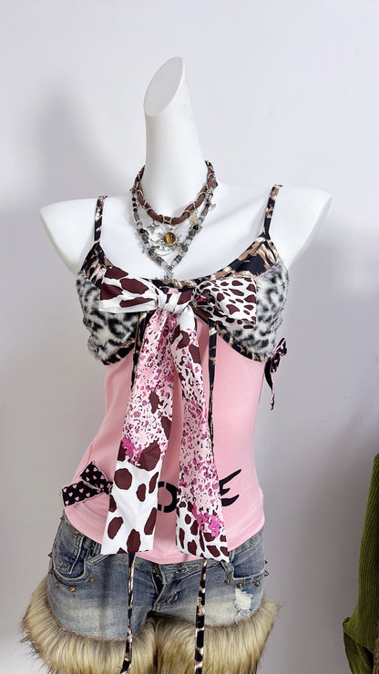 Pink patchwork camisole with leopard-print faux fur bust and layered ribbon bow