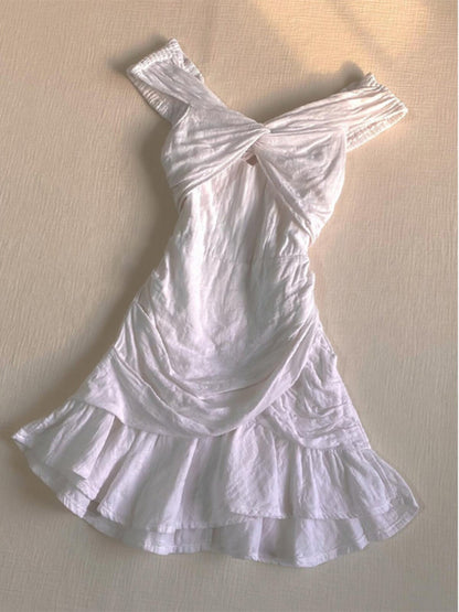 White one-shoulder short dress with off-shoulder bow and layered ruffle skirt
