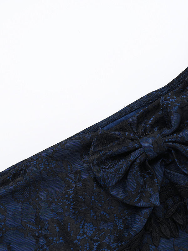 Off-shoulder jacquard top with bow at neckline and black tassel trim