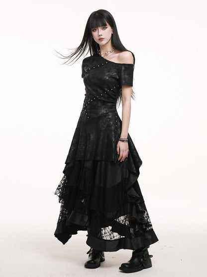 Black irregular tiered maxi skirt with elastic waist and lace-overlay panels at hem