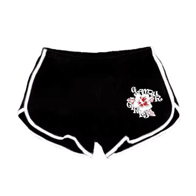 Black shorts with white piping along edges and small graphic logo