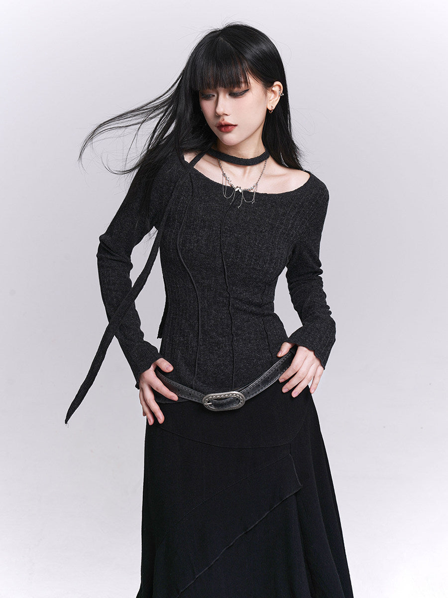 Black slim long-sleeve fitted inner top with round neckline and vertical seam details