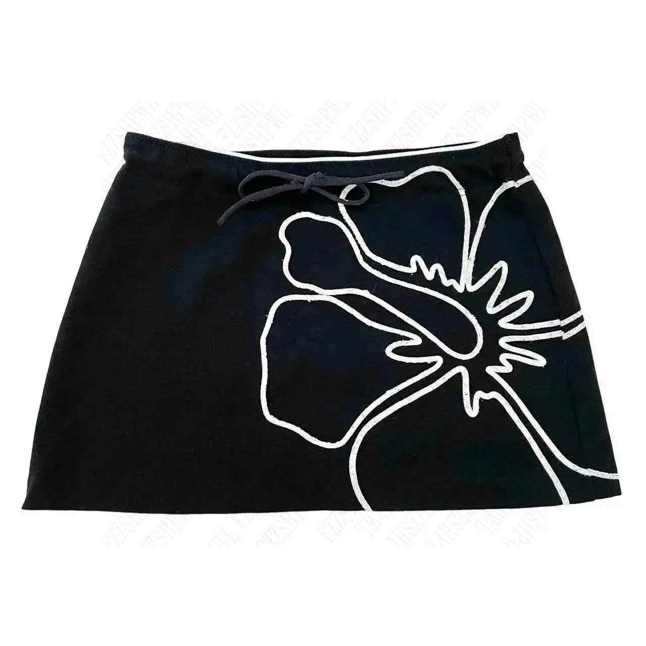 Black mini skirt with white outline animal graphic and adjustable waist tie