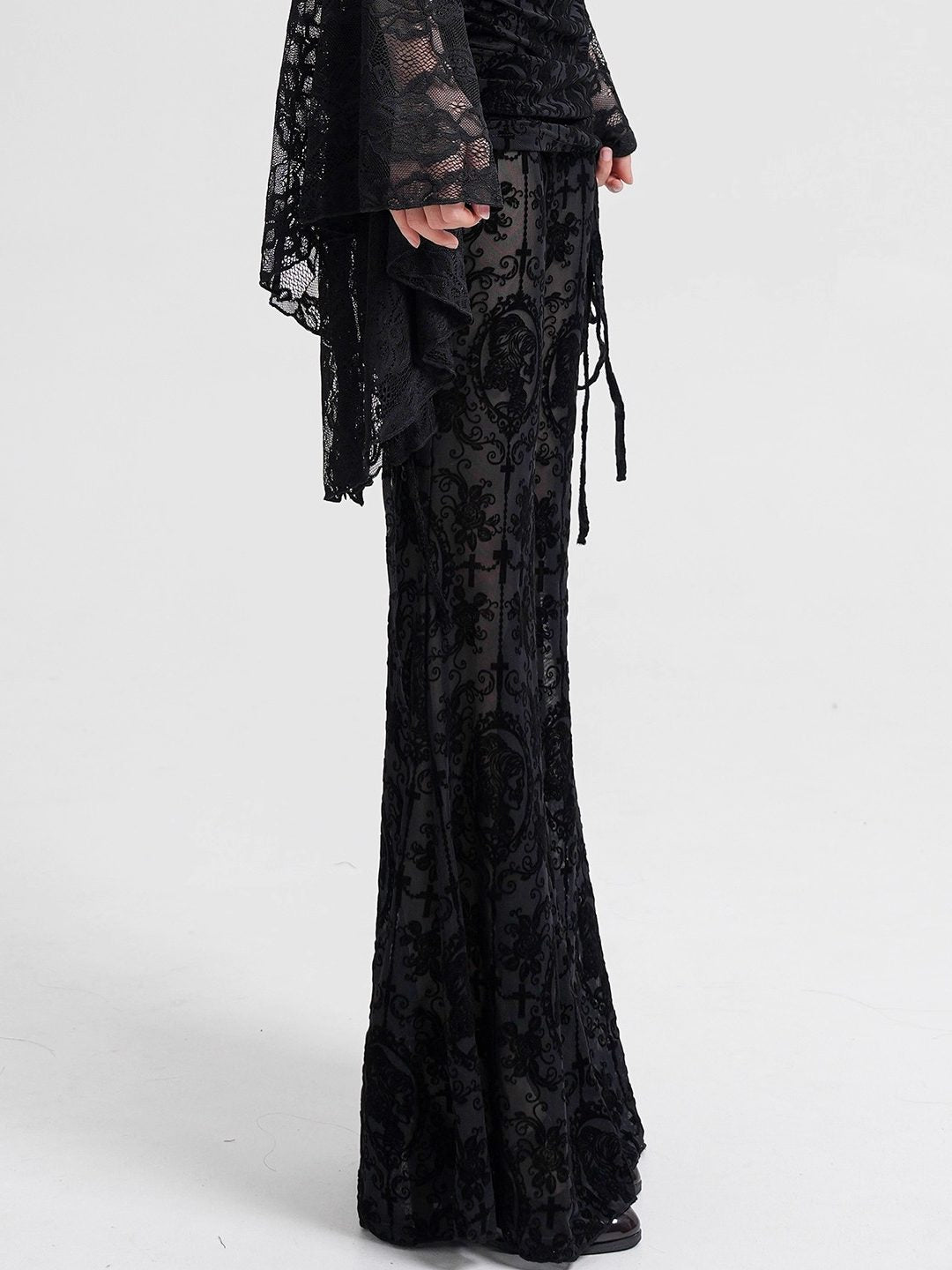Black mesh flocked culottes with flared bell-leg silhouette and side tassels