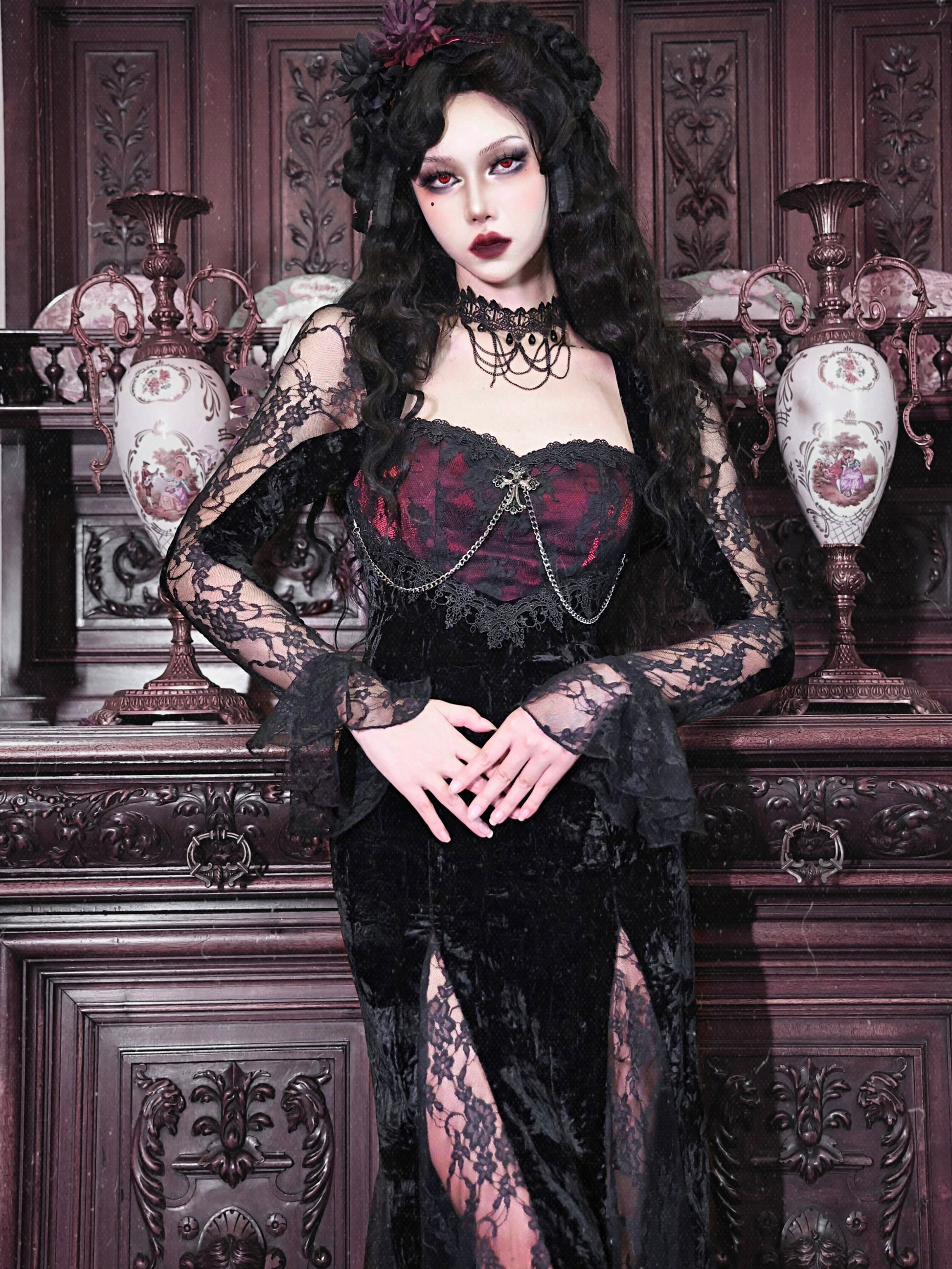 Black lace corset gown with burgundy bust panel, long sheer sleeves, front lace-up detail