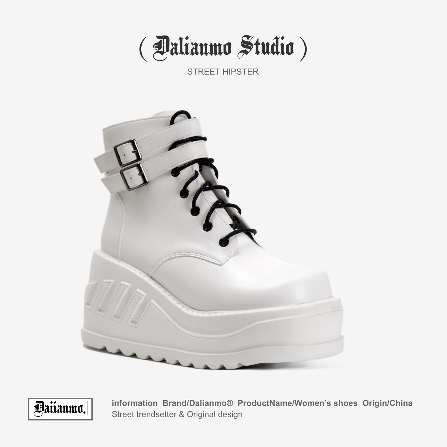 White lace-up platform boots with top buckle strap and chunky tread sole