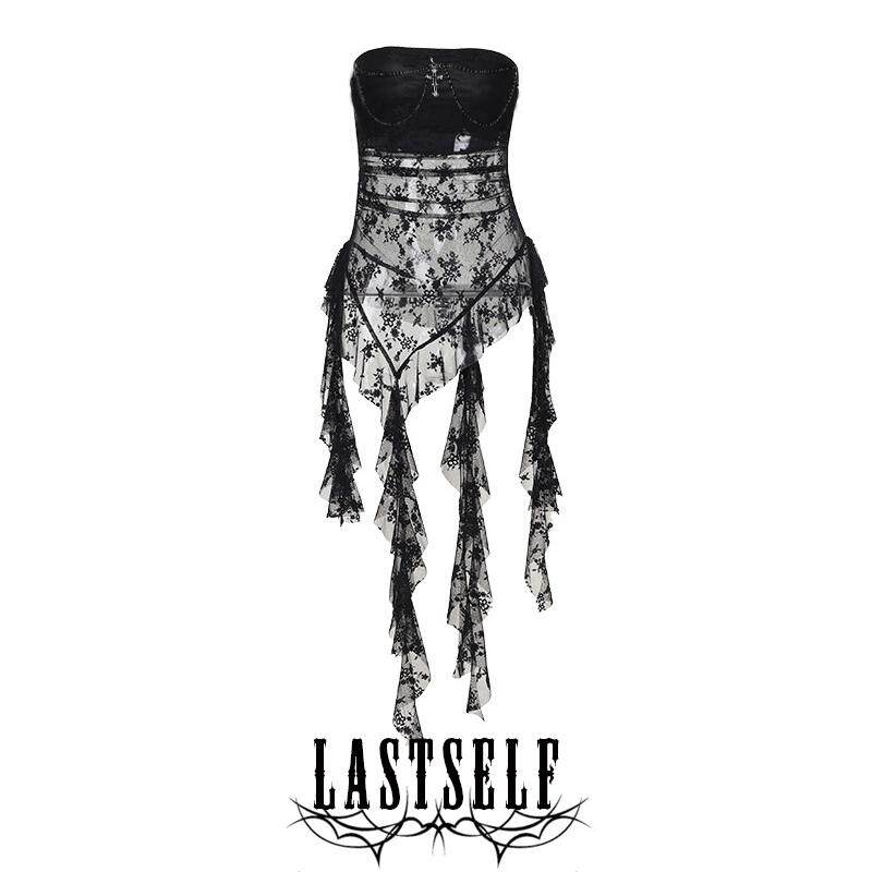 Black bandeau wrap top with sheer lace overlay, ruffle fringe hem and chain cross detail