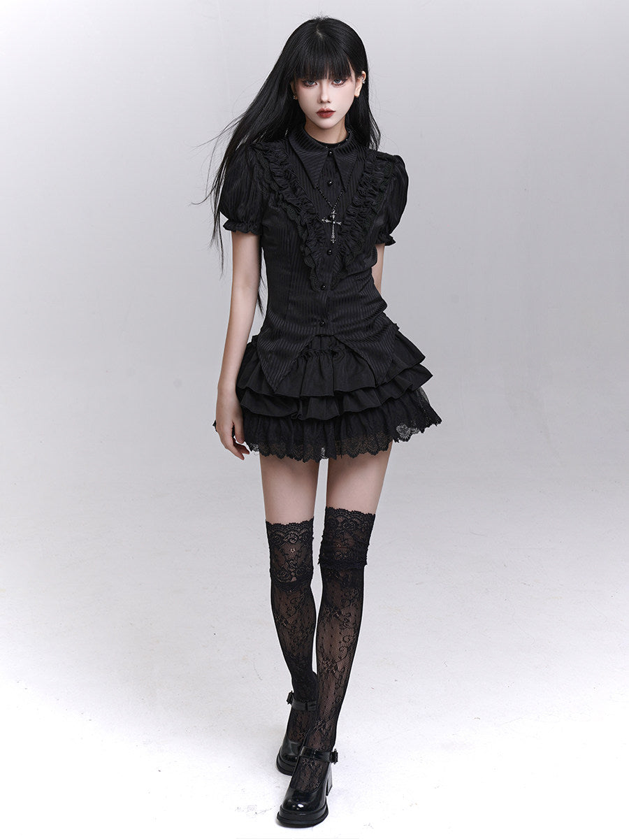 Black short-sleeved blouse with ruffled button-front placket and layered ruffle hem