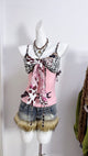 Pink patchwork camisole with leopard-print faux fur panels and bow-tied straps
