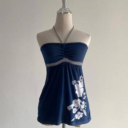 Navy bandeau mini dress with white floral side panel and gathered waist