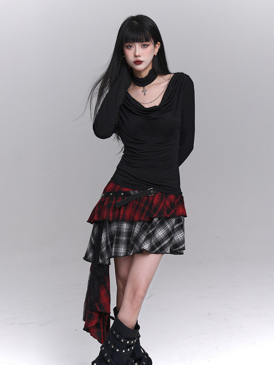 Asymmetrical plaid mini skirt with studded black waist belt and red-black, black-and-white layers