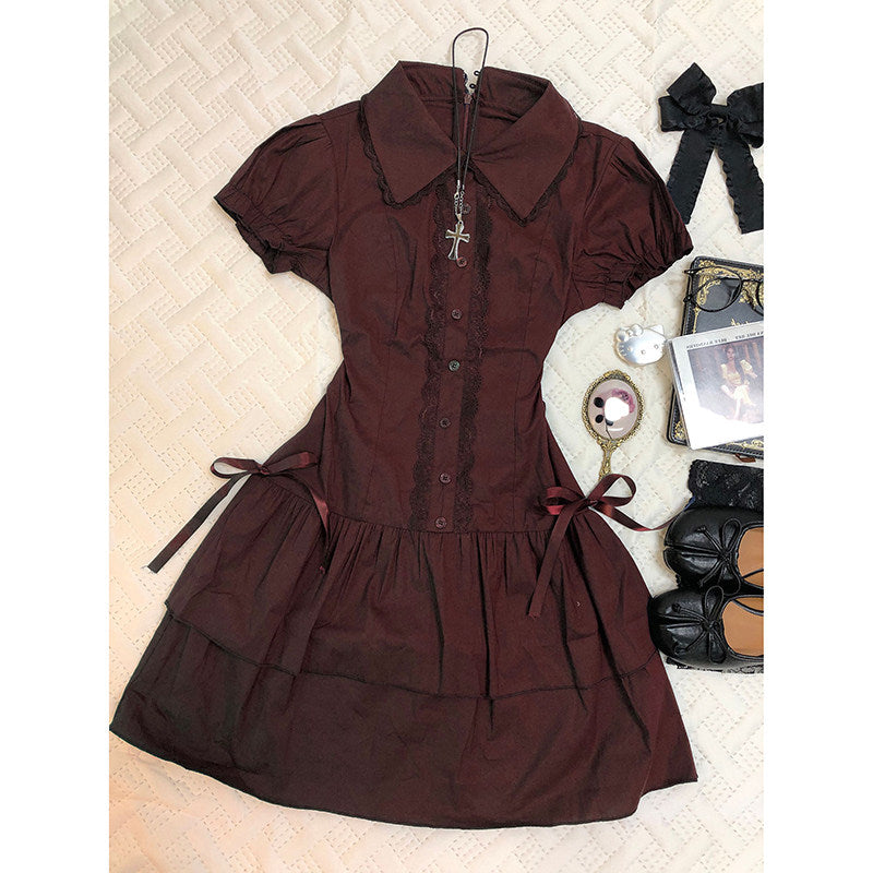 Burgundy lace patchwork dress with puff sleeves, button placket, and waist ribbon ties.