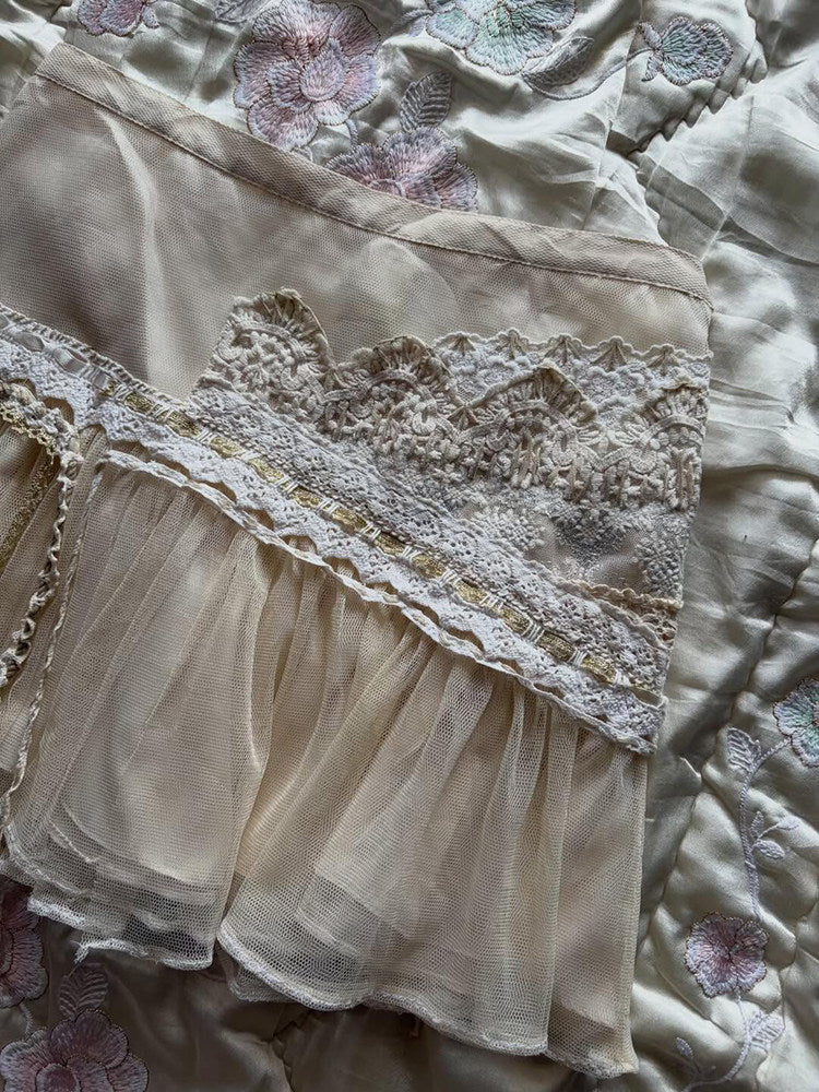 Lace-trimmed tulle midi skirt with scalloped floral yoke and embroidered band