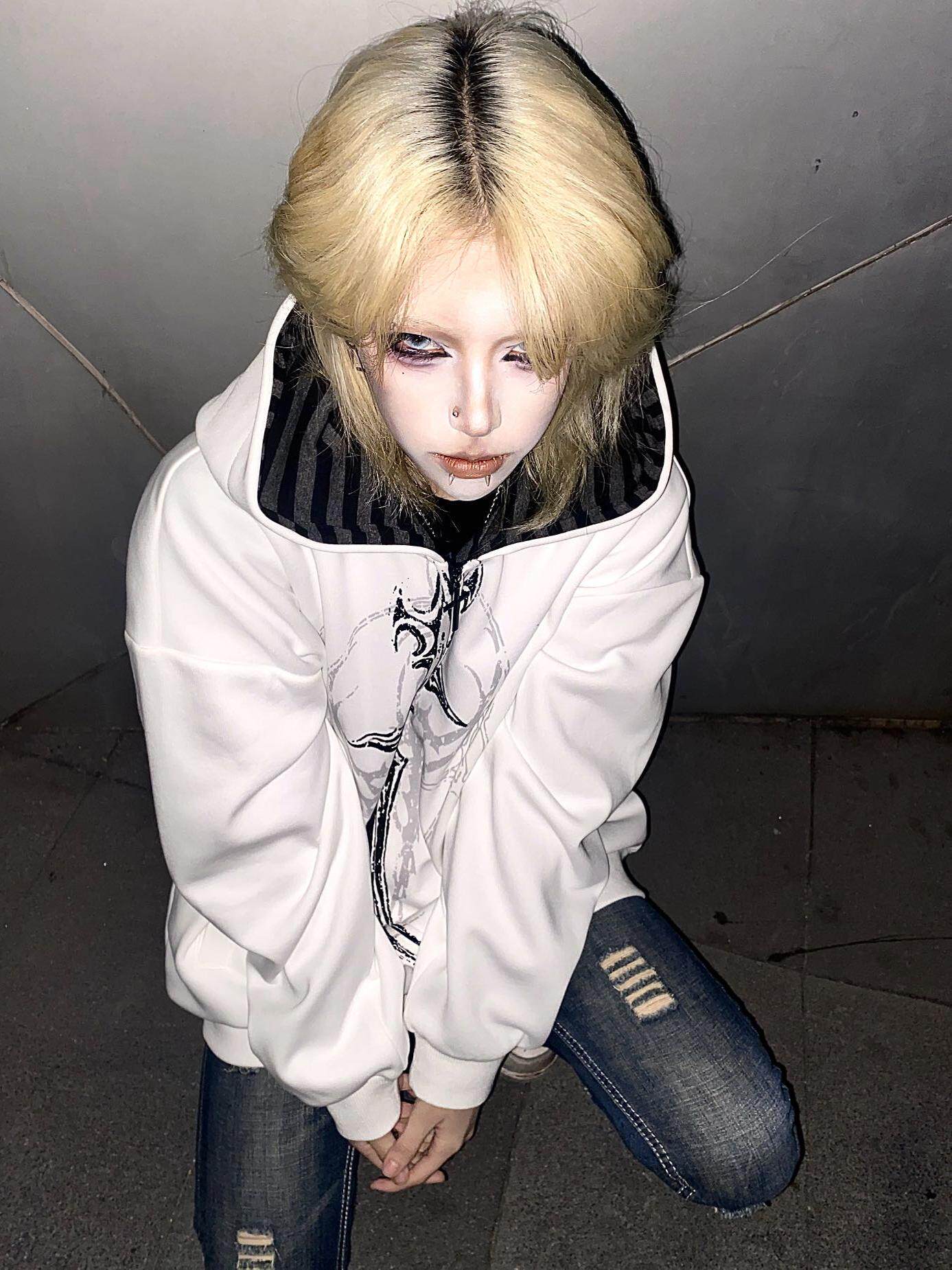 White hooded loose jacket with gothic cross front print and long sleeves